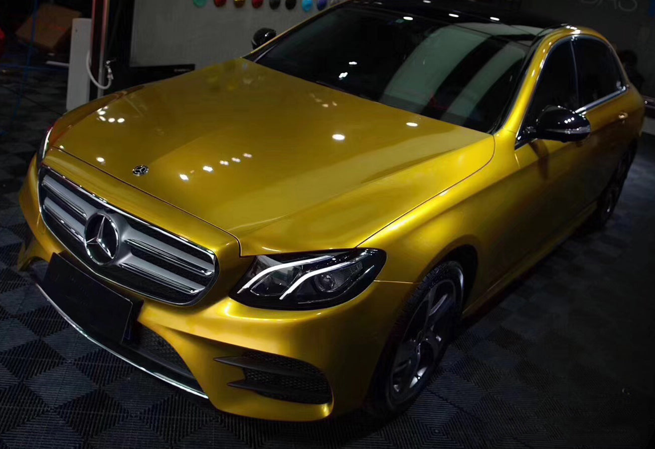Mallcas™ Glossy Metallic Amber Gold Vinyl Wrap (PET Liner)